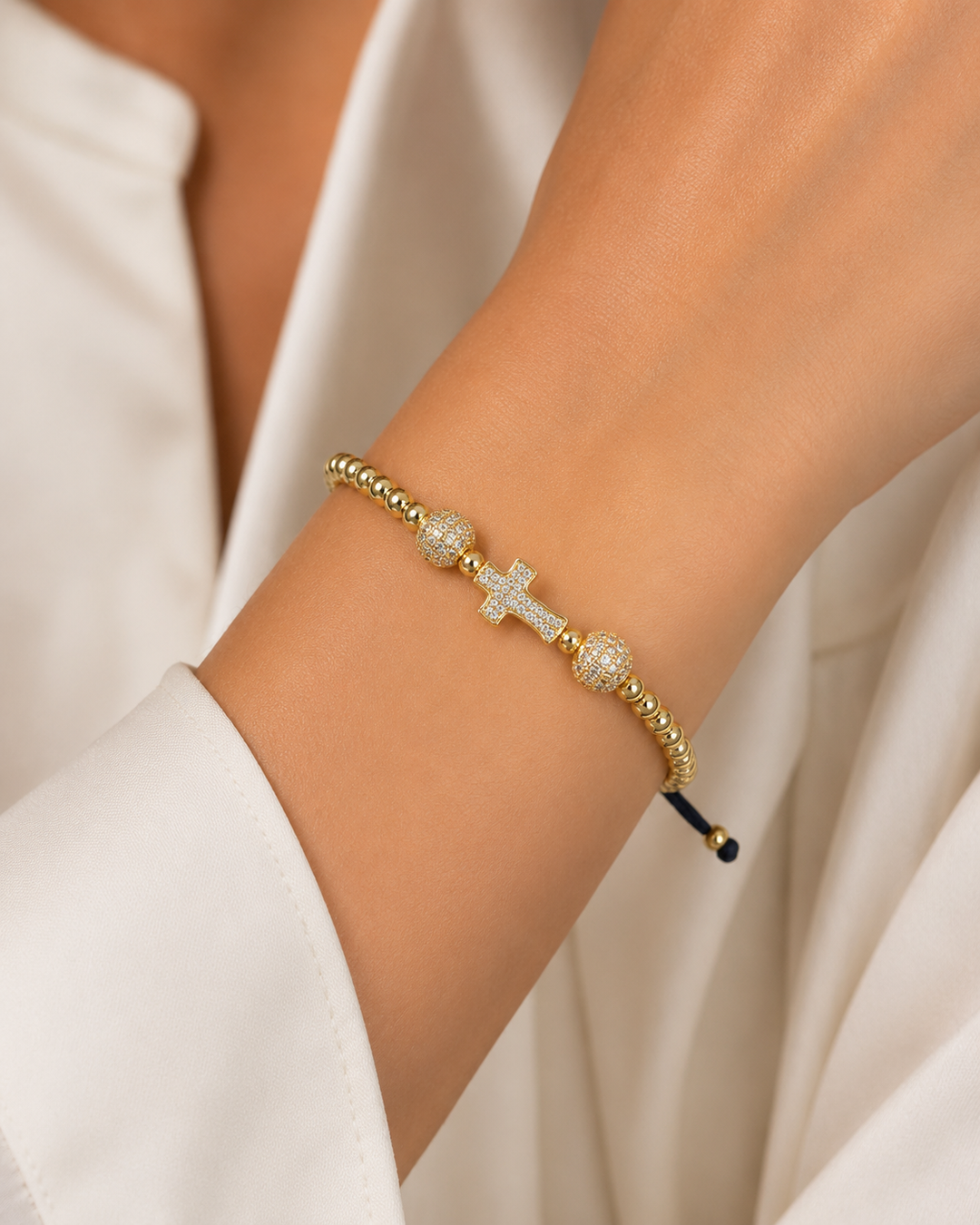 Ms Allure Cross My Heart Bracelet — gold-tone cubic zirconia bracelet with an elegant, feminine finish.