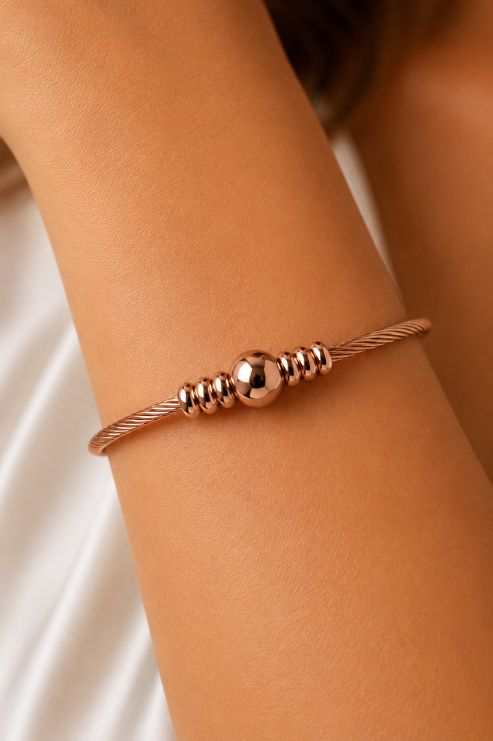 Ms Allure Dainty Ball Bracelet — gold-tone stainless steel bracelet with an elegant, feminine finish.