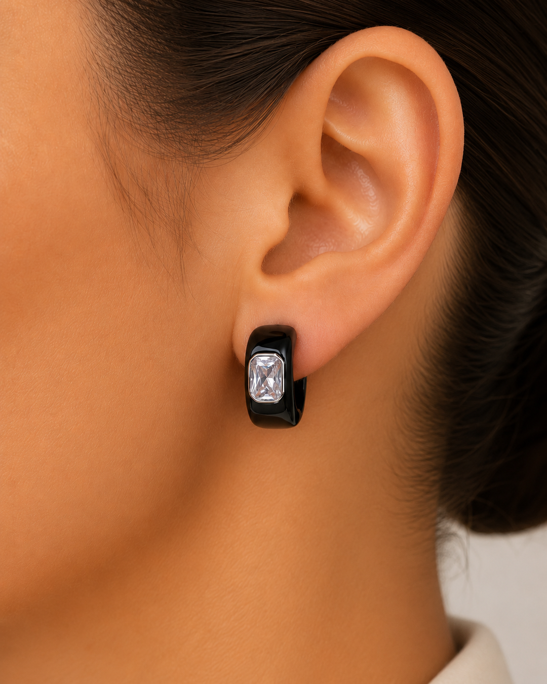 Ms Allure Bold Bling Earrings — black and gold-tone cubic zirconia earrings with an elegant, feminine finish.