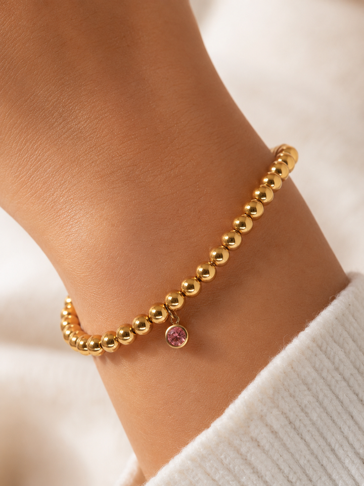 Ms Allure Birth Month Bracelet — gold-tone cubic zirconia bracelet with an elegant, feminine finish.