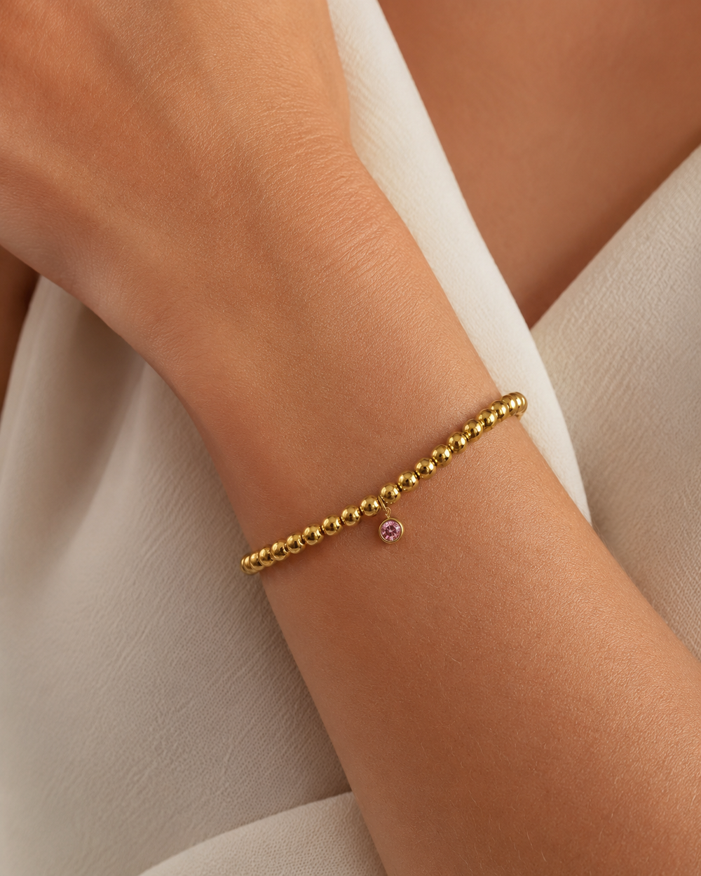 Ms Allure Birth Month Bracelet — gold-tone cubic zirconia bracelet with an elegant, feminine finish.