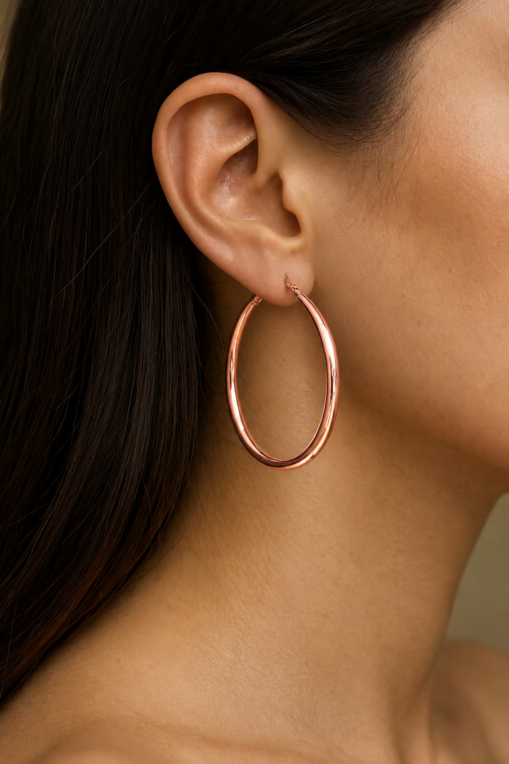 Ms Allure Unbreakable Earrings — gold-tone stainless steel hoop earrings with an elegant, feminine finish.