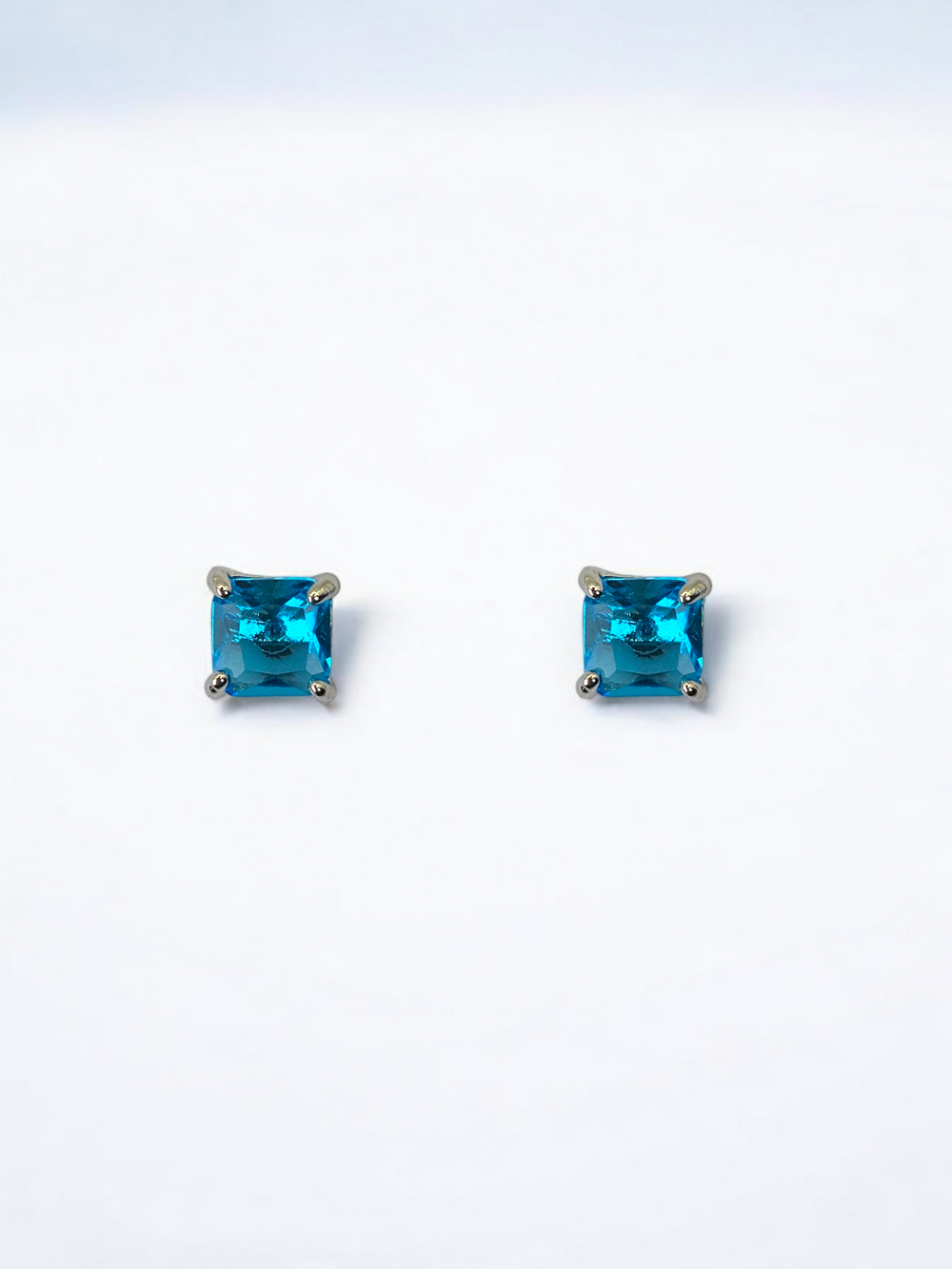 Ms Allure Blueberry Drops — blue and silver-tone cubic zirconia earrings with an elegant, feminine finish.