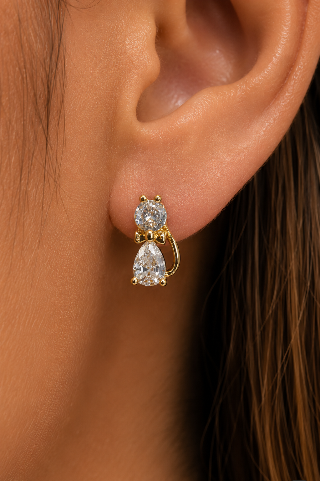 Ms Allure Fancy Cat Earrings — gold-tone cubic zirconia earrings with an elegant, feminine finish.