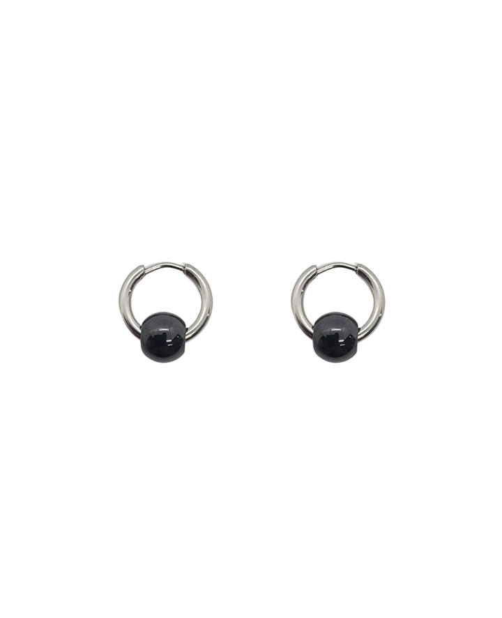 Ms Allure Balanced Loop Earrings — black and silver-tone ceramic earrings with an elegant, feminine finish.