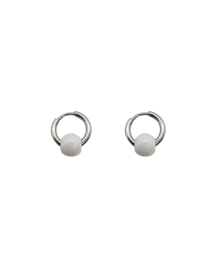Ms Allure Balanced Loop Earrings — black and silver-tone ceramic earrings with an elegant, feminine finish.
