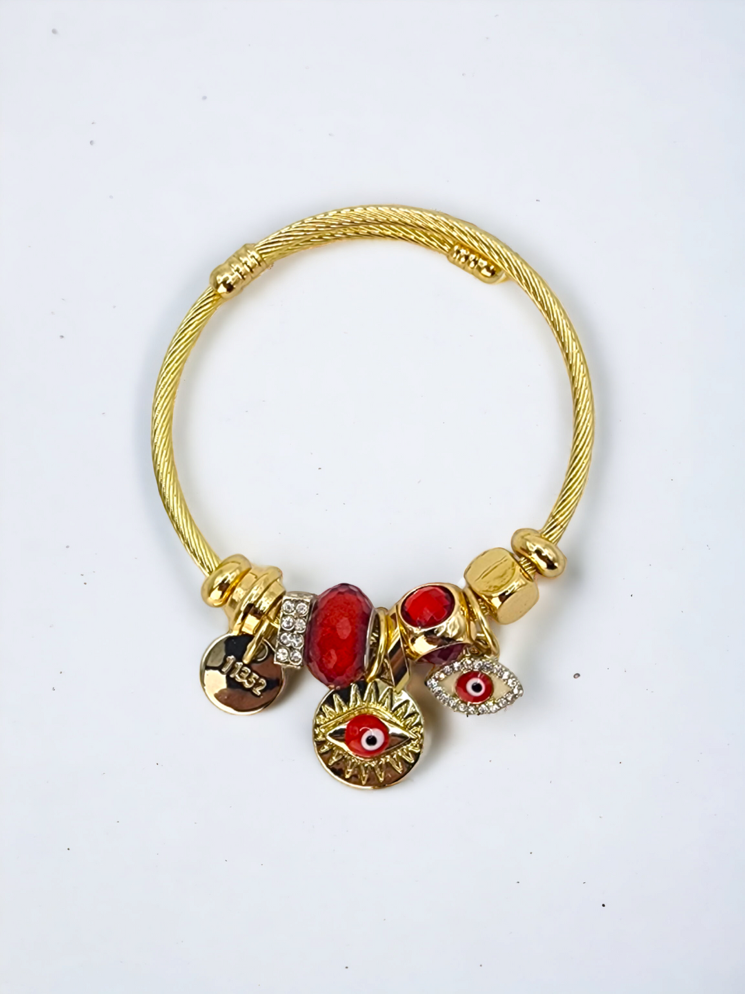 Ms Allure Foresight Bracelet — gold-tone and red stainless steel bracelet with an elegant, feminine finish.